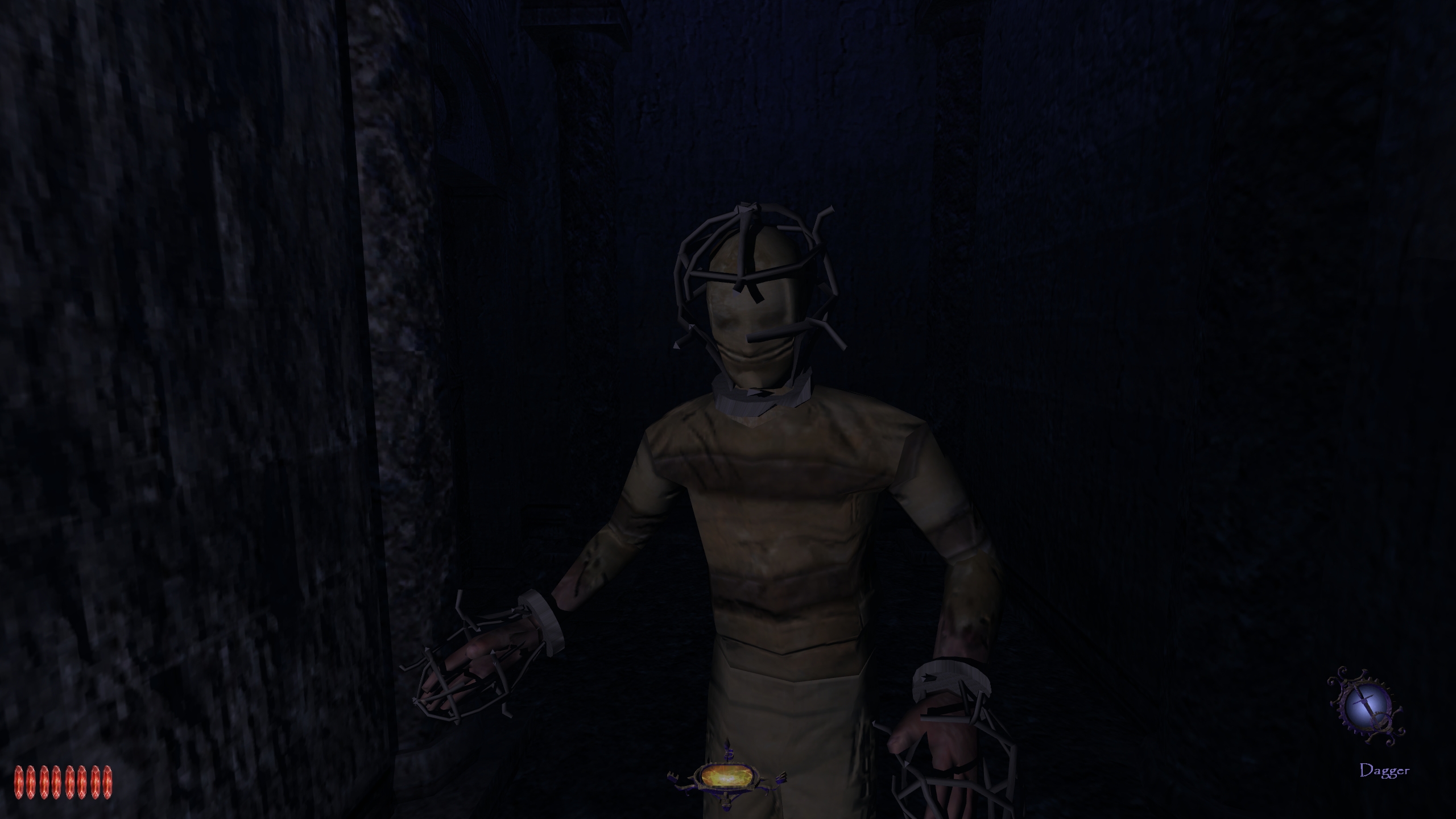One of the Cradle's inmates, with caged head and hands